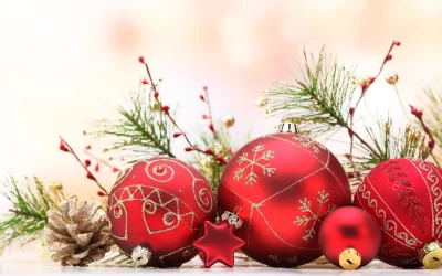 Vibrant Red Christmas Ornaments with Golden Accents and Festive Pine Branches image