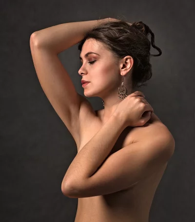 Sensual Portrait of Young Woman with Dark Hair and Closed Eyes image