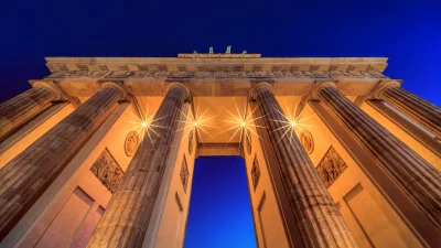 Brandenburg Gate Berlin Illuminated Night Sky Cinematic Wallpaper Style image