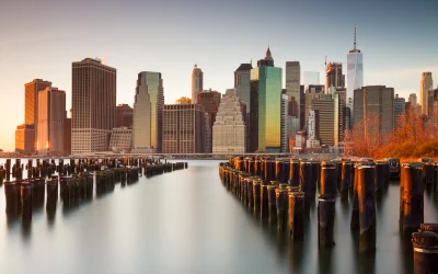 Iconic Lower Manhattan Skyline and Historic Pier Pilings at Golden Hour Sunset image