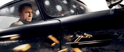 James Bond Daniel Craig in Bullet-Riddled Car with Intense Gaze Action Scene image