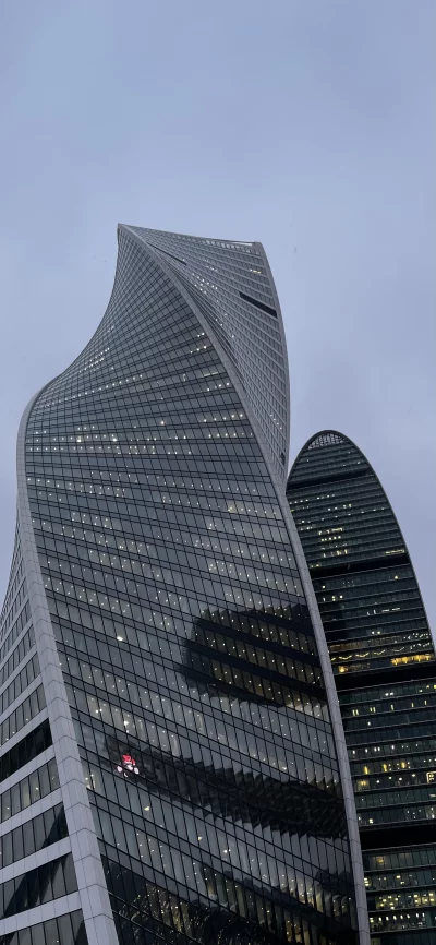 Iconic Moscow City Skyscrapers at Dusk Reflecting City Lights