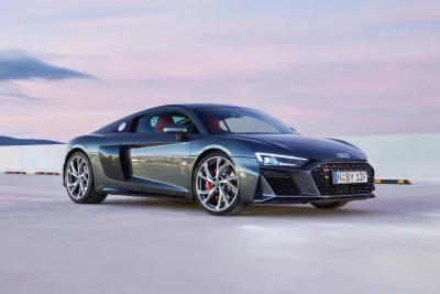 Sleek Audi R8 V10 Performance Coupe on Rooftop at Twilight image