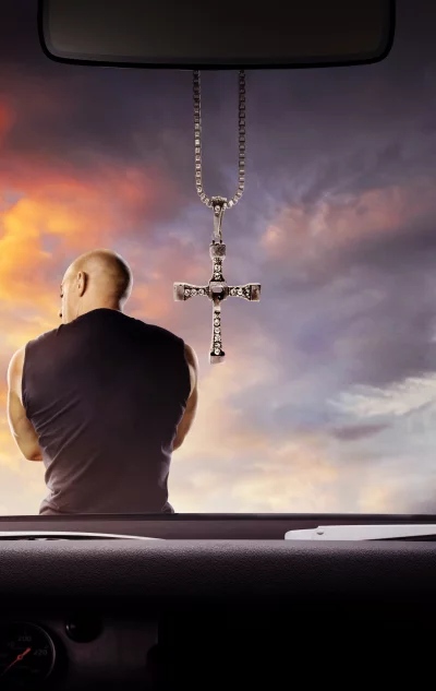 Iconic Dominic Toretto with Cross Necklace in Car, Reflecting on Sunset Journey image