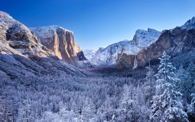 Majestic Yosemite Valley Winter Landscape with Snow-Covered Mountains and El Capitan image