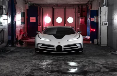 Exclusive White Bugatti Centodieci Hypercar in Dramatic Industrial Automotive Environment image
