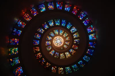 Vibrant Spiral Stained Glass Window Abstract Architectural Design image