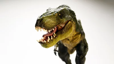 Fierce Tyrannosaurus Rex Dinosaur Toy Roaring with Open Jaws and Sharp Teeth image