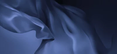 Elegant Blue Gradient Fabric Abstract Background with Smooth Flowing Waves image