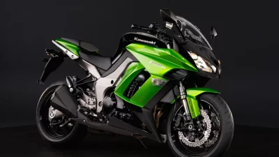 Sleek Kawasaki Z1000SX Sport Touring Motorcycle on Dark Studio Background image