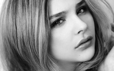 Dramatic Monochrome Close-up of Young Woman's Face and Piercing Gaze image