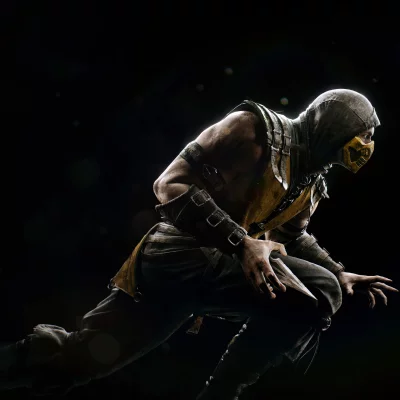 Mortal Kombat Scorpion preparing to strike in iconic yellow ninja attire image