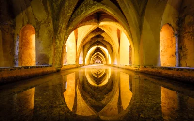 Grand Arched Hallway Reflecting Golden Light in Ancient Water Pool image