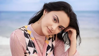 Captivating Young Woman in Pink Knit and Geometric Dress by Serene Ocean image