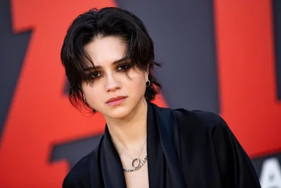 Expressive Young Woman with Dark Hair and Striking Makeup at Red Carpet Event image