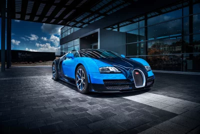 Luxurious Bugatti Veyron Supercar Parked at Modern Office Building image
