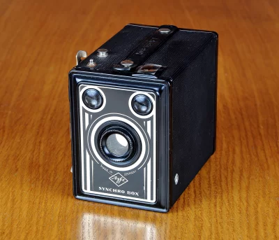 Agfa Synchro Box Vintage Camera on Polished Wood Surface image