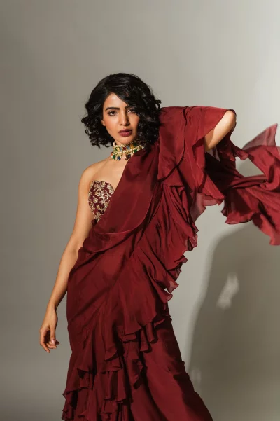 Samantha Ruth Prabhu Elegant Pose in Ruffled Maroon Saree with Exquisite Gemstone Jewelry image