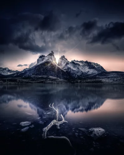 Cinematic Mountain Lake Sunset with Dramatic Cloudy Sky and Glowing Light image