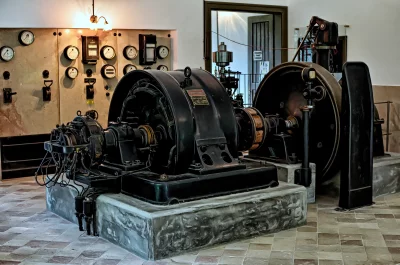 Historic Power Station Interior with Old Industrial Electrical Generator and Instruments image