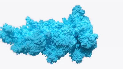 Vibrant Blue Ink Cloud Expanding in Water on Clean White Background image
