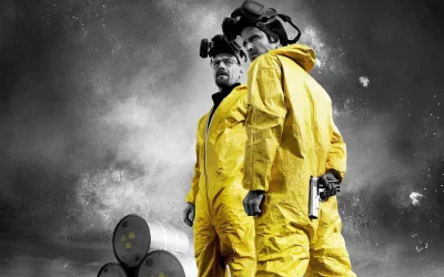 Two Men in Yellow Hazmat Suits with Handgun and Radioactive Barrels on Smoky Background image