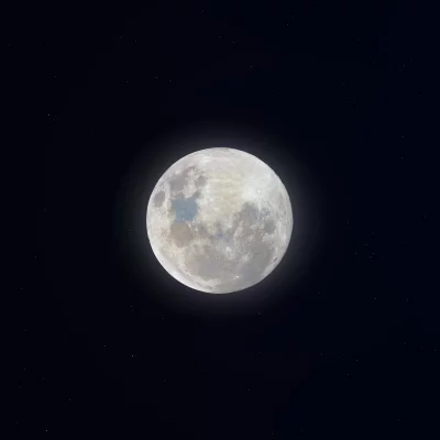Detailed Full Moon Revealing Craters and Markings in Deep Space image