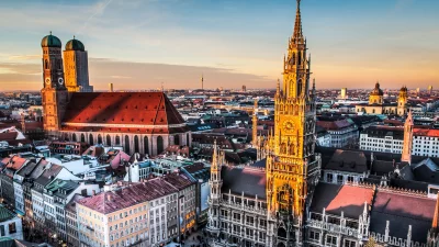 Panoramic View of Munich Cityscape at Golden Hour Sunset with Famous Landmarks image