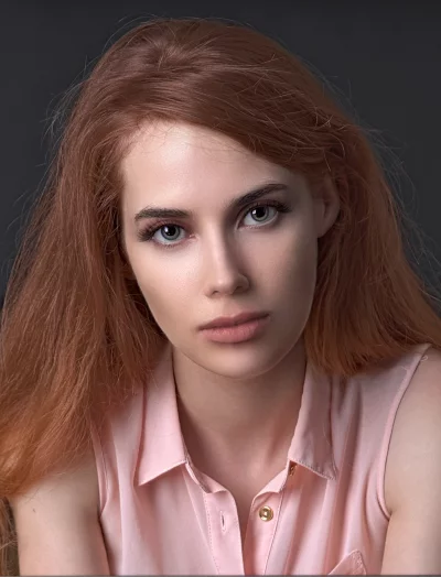 Expressive Redhead Woman Portrait: Direct Gaze, Pink Blouse image