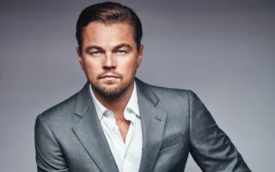 Handsome Leonardo DiCaprio Posing Confidently in a Professional Grey Suit Studio Portrait image