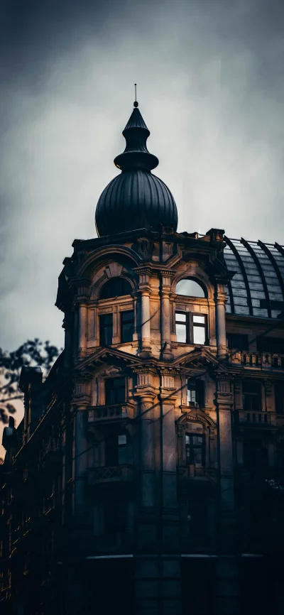 Gothic Building Dome and Ornate Facade with Dramatic Lighting