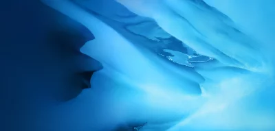 Abstract Fluid Blue Waves with Smooth Gradient Transition and Shimmering Light image