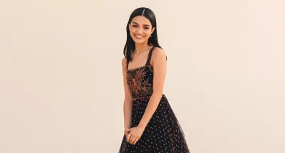 Stunning Young Woman in Elegant Beaded Black Gown with Intricate Butterfly Motif image