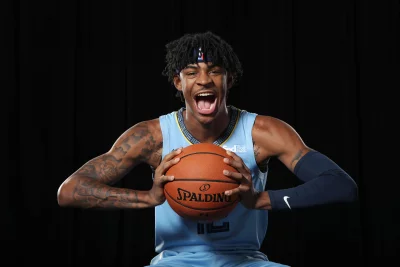 Ja Morant, Memphis Grizzlies Star, Roaring with Basketball in Dynamic Studio Portrait image
