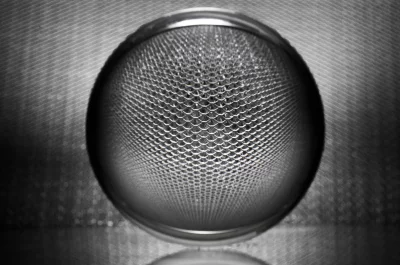 A close-up of a metal speaker grill