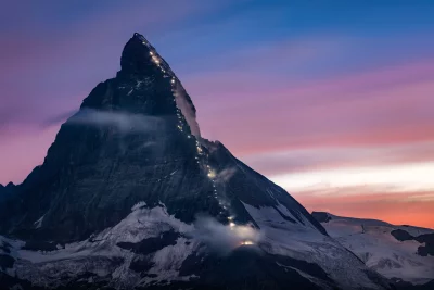 Climbers Ascending Matterhorn Mountain at Twilight: Alpine Adventure at Dawn image