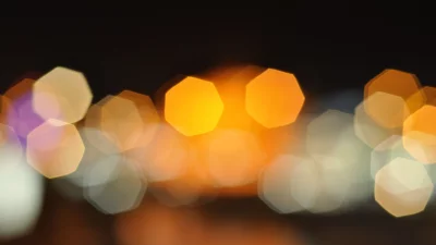 Vibrant Hexagonal Bokeh Lights Abstract Glow on Dark Background for Festivities image