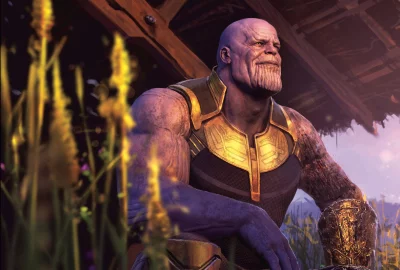 Thanos, the powerful Mad Titan, sits contemplatively in his golden armor after achieving his goal image