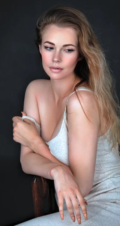Beautiful Young Woman Sitting Thoughtfully Elegant Pose Studio Light Stock Photo image