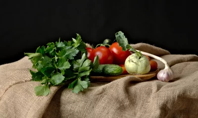 Fresh Organic Vegetables on Rustic Burlap with Dark Background image