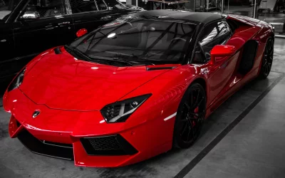 Striking Red Lamborghini Aventador Luxury Supercar with Sleek Black Roof image