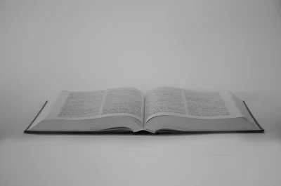 A black and white photo of an open book
