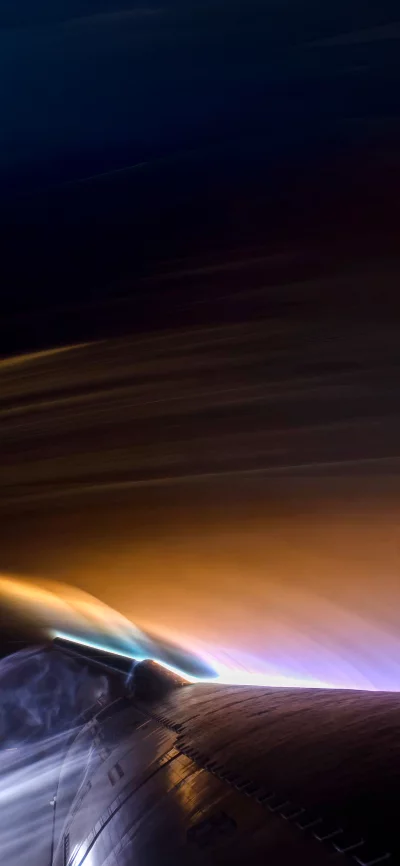 Spectacular low angle view of a spaceship wing with purple and gold exhaust trails