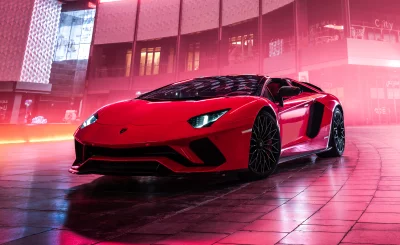 Dynamic Red Lamborghini Supercar Gleaming in Vibrant Urban Night Setting image