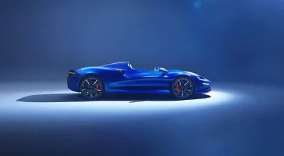 Dynamic Blue McLaren Supercar in Striking Studio Lighting image