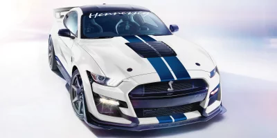 White Hennessey Ford Mustang Shelby GT500 Sports Car with Bold Blue Racing Stripes image