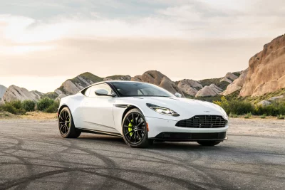 White Aston Martin DB11 Sports Car in Arid Rocky Landscape image
