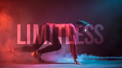 Dynamic Athlete in Starting Block with "LIMITLESS" Text in Vivid Neon Smoke image