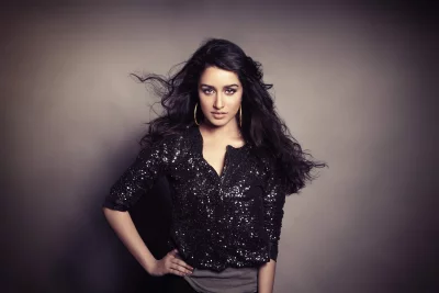 Shraddha Kapoor Confidently Posing in Black Sequin Top with Windswept Hair image