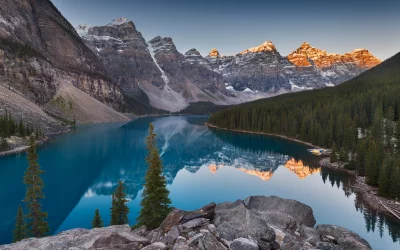 Majestic Moraine Lake Sunrise Over Snow Capped Mountains and Turquoise Water image